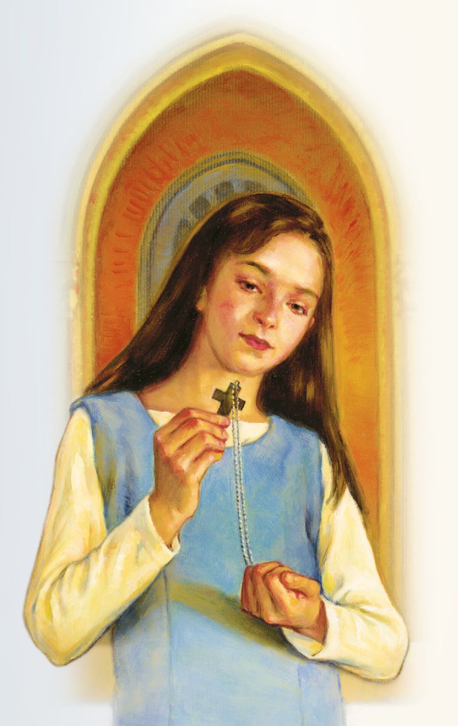 A girl holds rosary beads