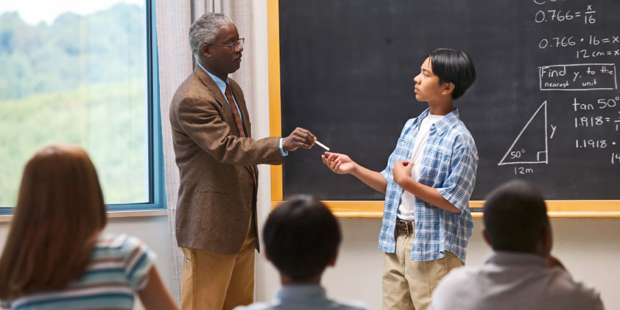 A teacher allowing a rebel student to show the class a supposed solution to a difficult problem