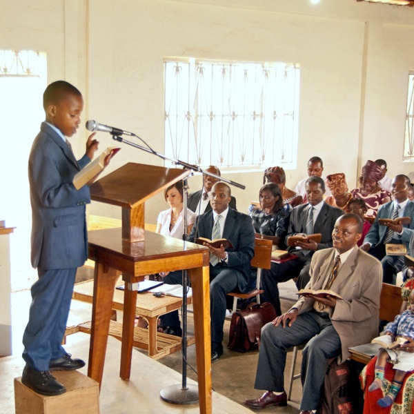 A young Witness reading the Bible in Uganda