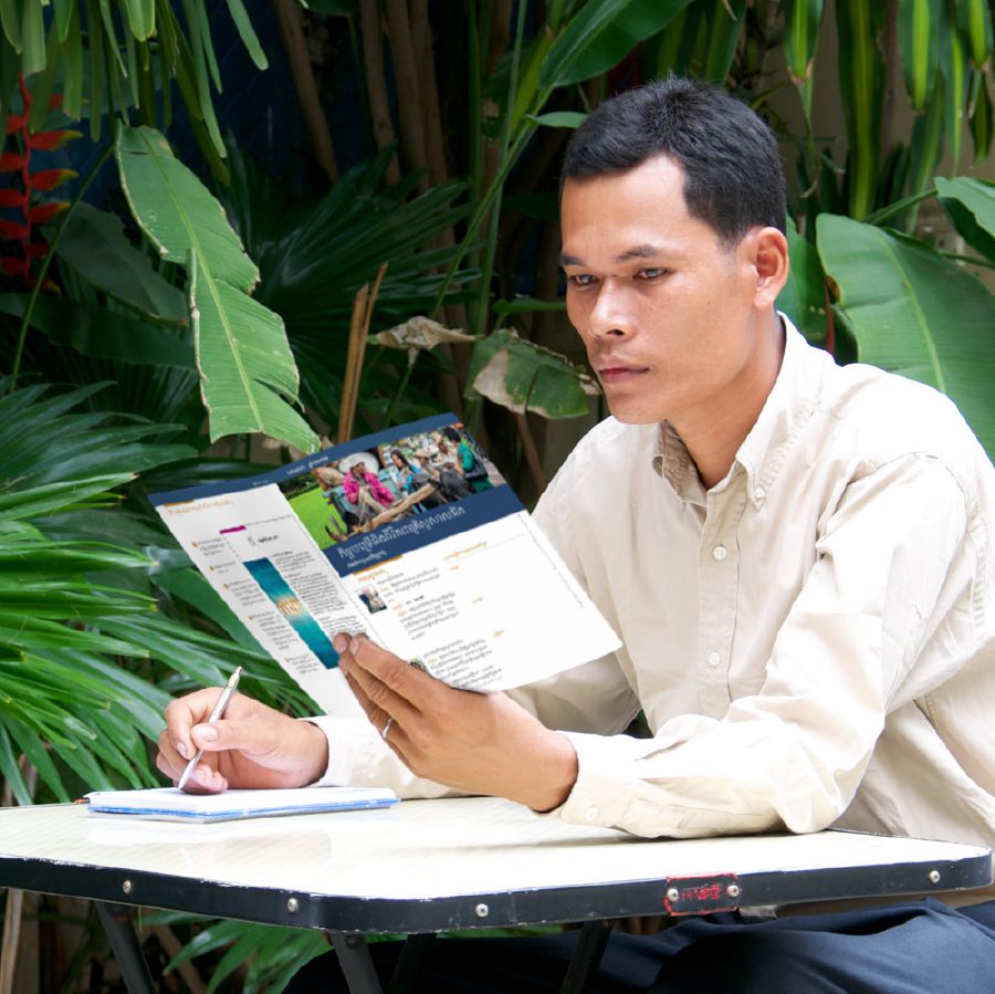 One of Jehovah’s Witnesses studying for a congregation meeting