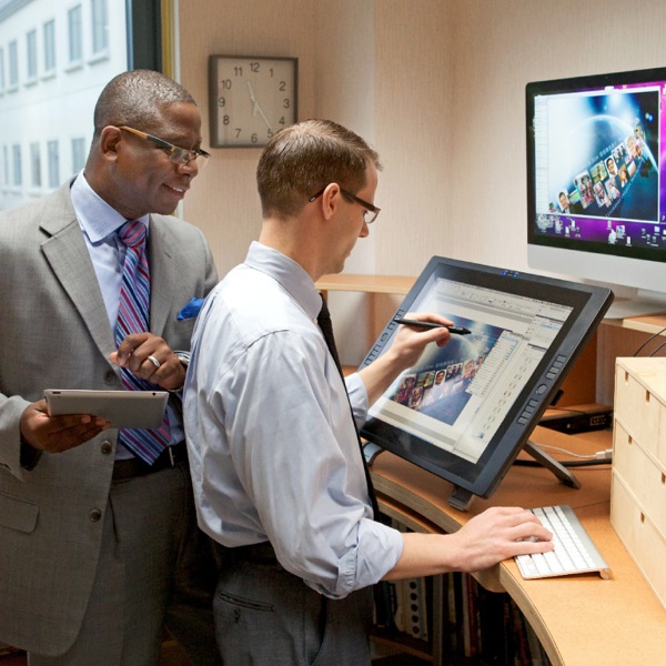 Two of Jehovah’s Witnesses working in the Art Department at Bethel