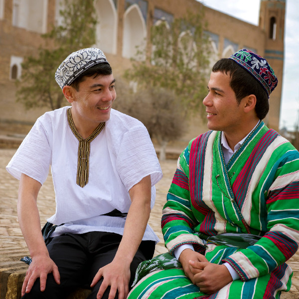 Two men in traditional Uzbek clothing