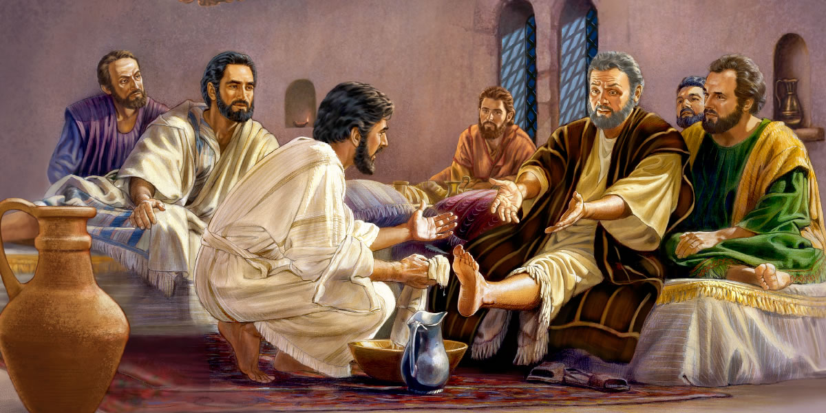 Jesus washes the feet of the apostles to teach them humility