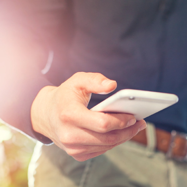 A person holds a cell phone