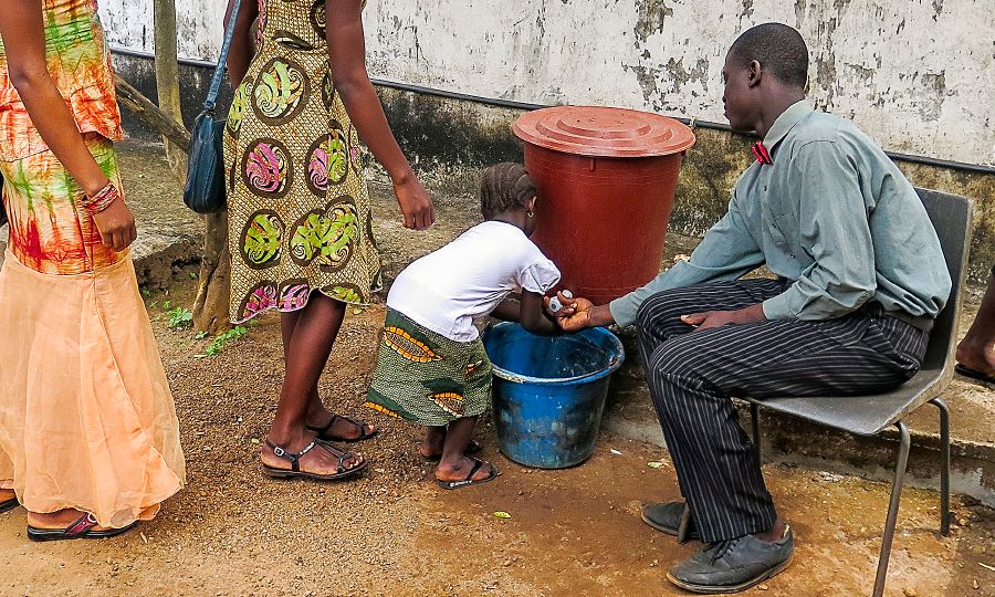 A hand-washing station outside a Kingdom Hall in West Africa