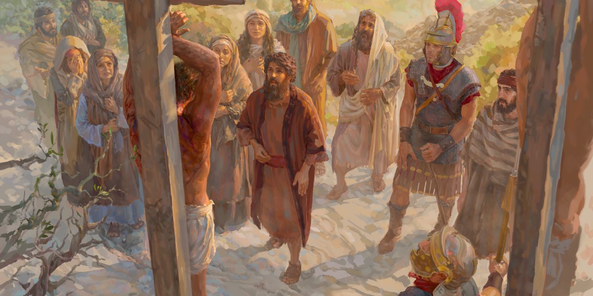 While Jesus hangs on a stake, an army officer and some of Jesus’ disciples, including Mary and John, stand nearby