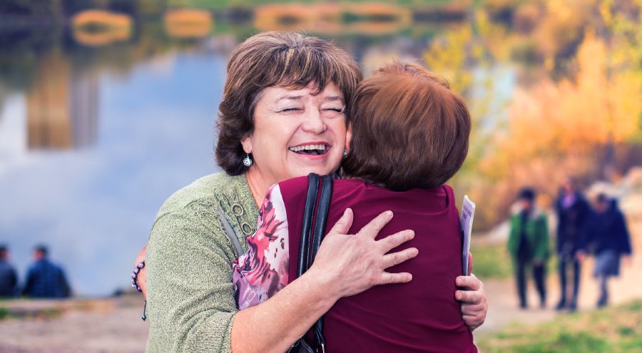 Two sisters embrace