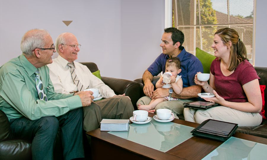 Edward Bazely and another brother make a shepherding visit on a family