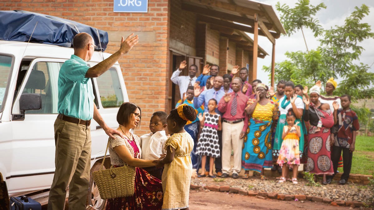 A couple obliged to leave their missionary assignment say a tearful goodbye to their congregation