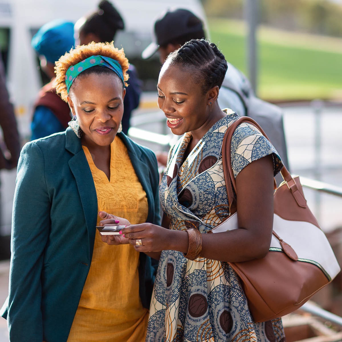 One of Jehovah’s Witnesses preaching to a woman.