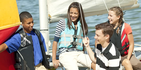 Teenagers sailing