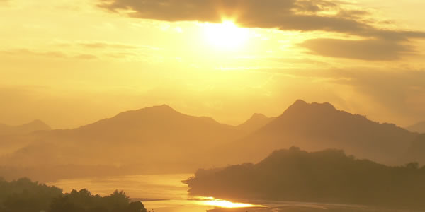 A sunset over mountains 