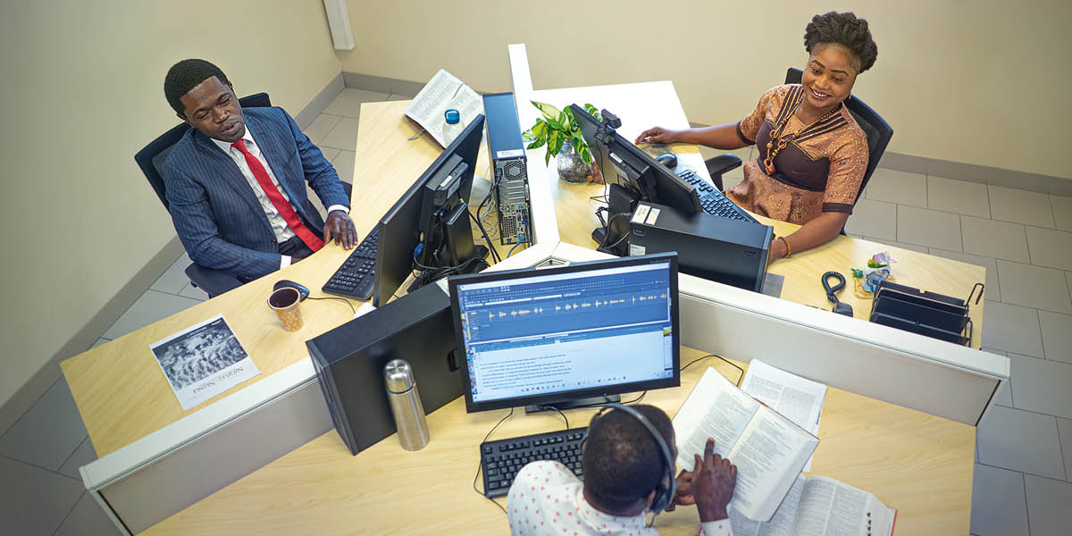 A translation team working together on a publication.