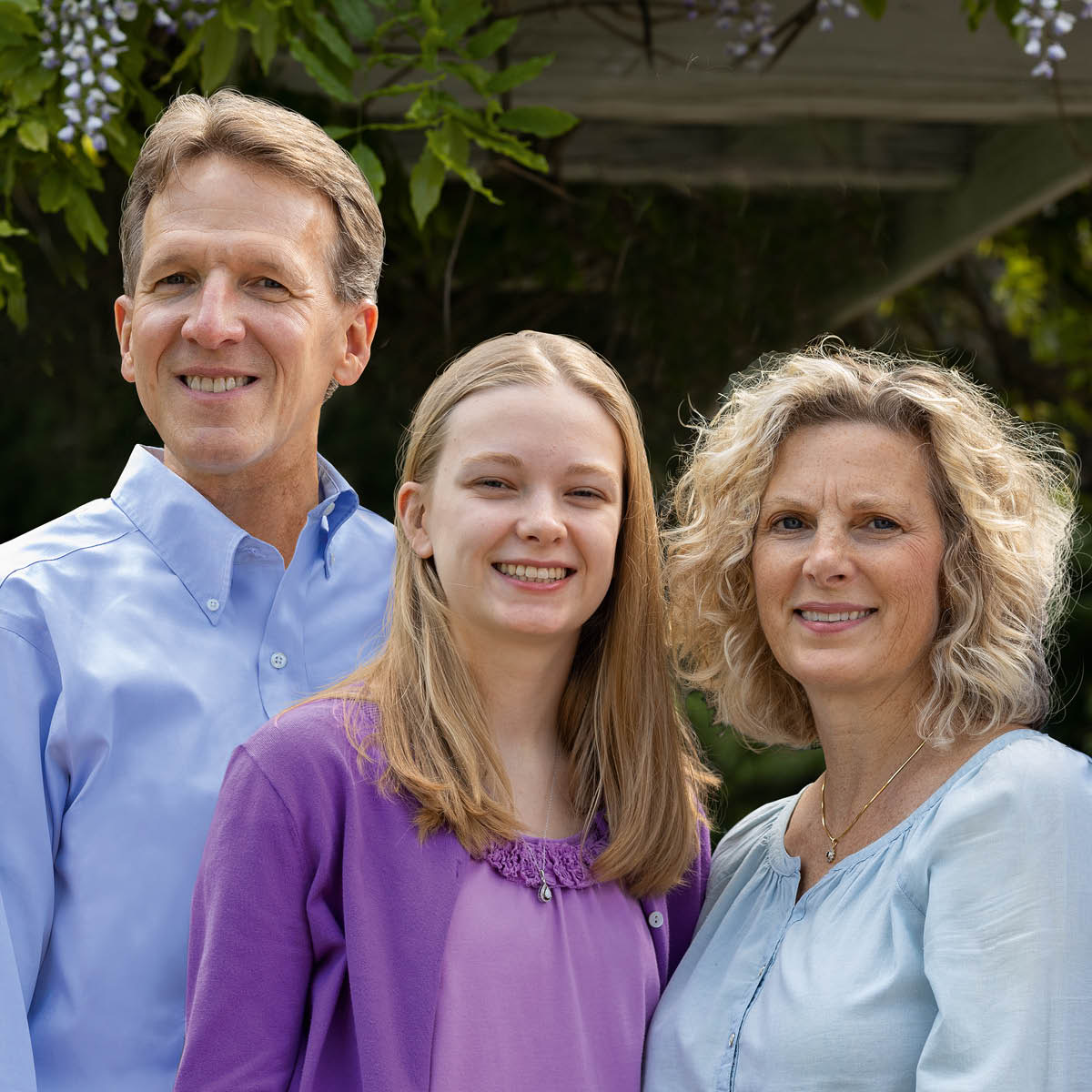 Gregory; his daughter, Olivia; and his wife, Audrey.