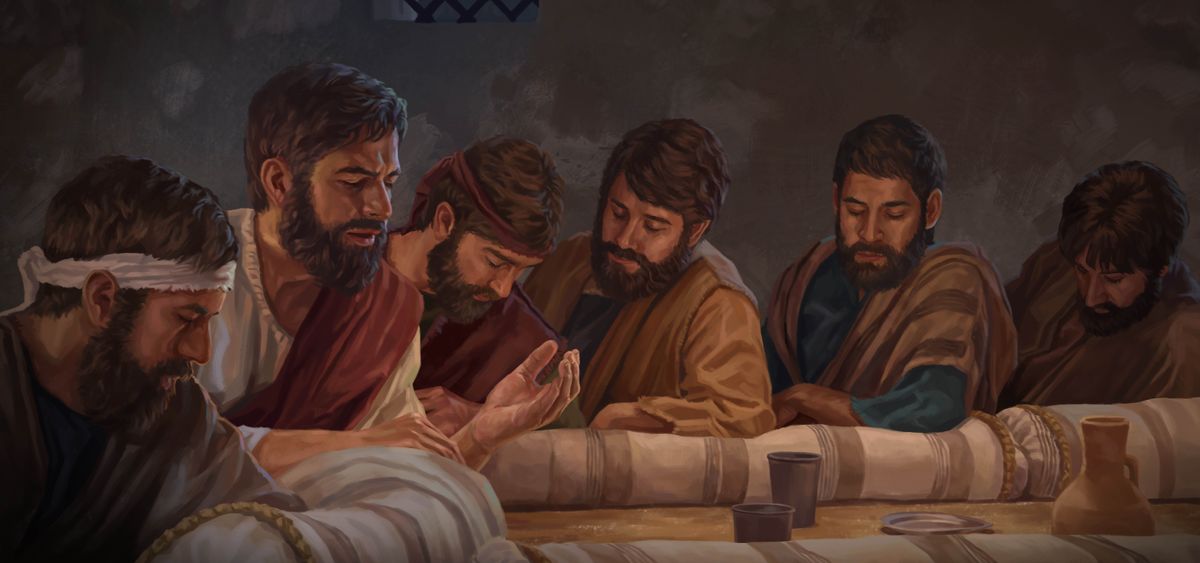 Jesus praying with his apostles at the Passover meal.